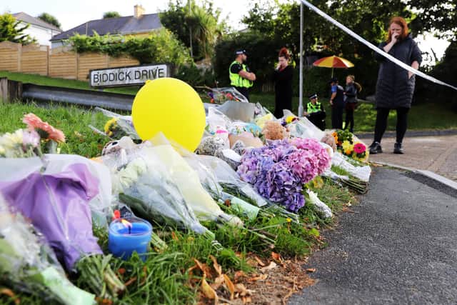 Tears and tributes in Plymouth near the scene of the mass shooting last week. (PHOTO BY: William Dax/Getty Images)