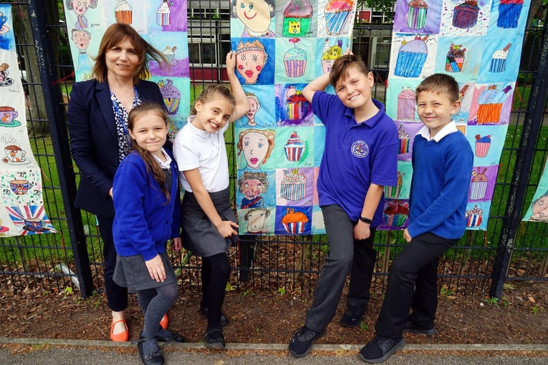 Berry Hill primary school jubilee celebrations with art work. Acting deputy head Melanie Price with year 3 pupils next to the artwork.