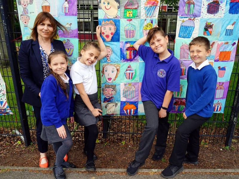 Berry Hill primary school jubilee celebrations with art work. Acting deputy head Melanie Price with year 3 pupils next to the artwork.