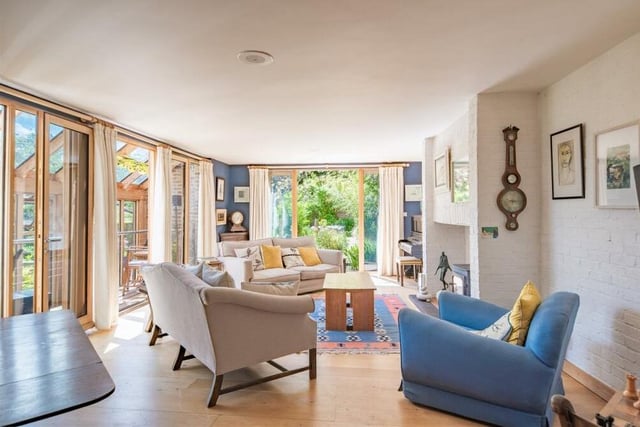 The stylish sitting room at the £1.5 million Southwell property has access to a balcony or roof terrace.