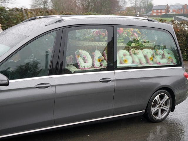 The funeral cortege outside Dalestorth Primary School