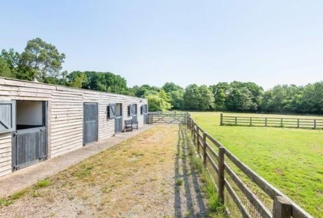This property has private equestrian facilities, including stabling and paddock grazing.