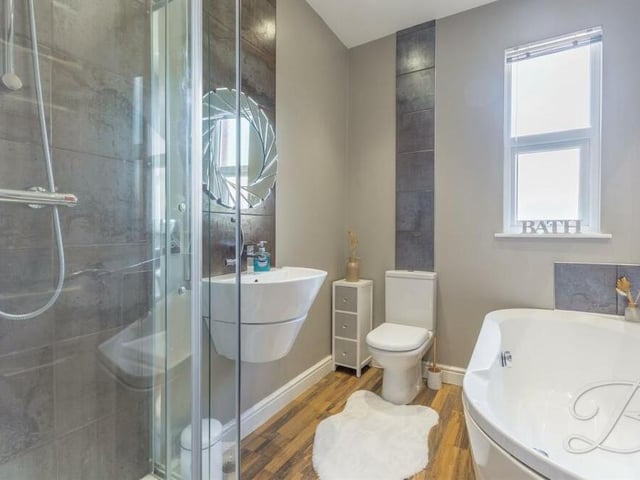 Sandwiched among the bedrooms on the first floor of the £575,000-plus property is this sleek family bathroom, complete with bath, shower cubicle, low-flush WC and wash hand basin, with window to the rear of the house..
