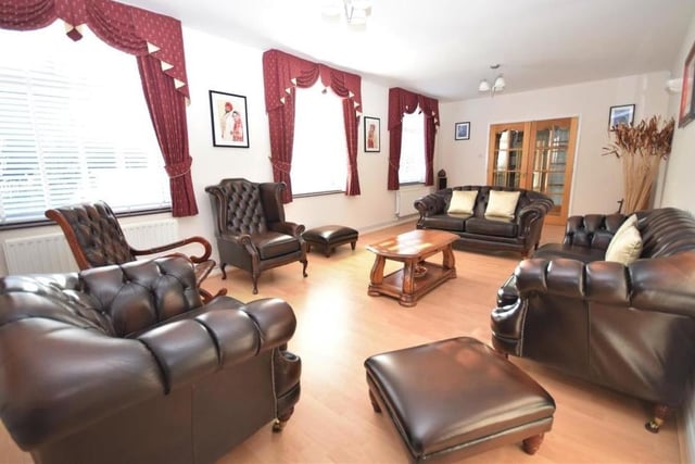 The living room oozes luxury and is large enough to accommodate a dining table and chairs if necessary. Tastefully decorated, with a wood laminate floor, it is a light and bright room thanks to three uPVC windows to the side of the property.