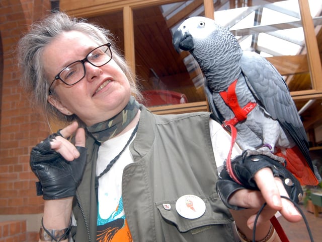 Britta Jacksop pictured with her African Grey Parrot at the Summer Safari of 2006 at Mansfield Museum.