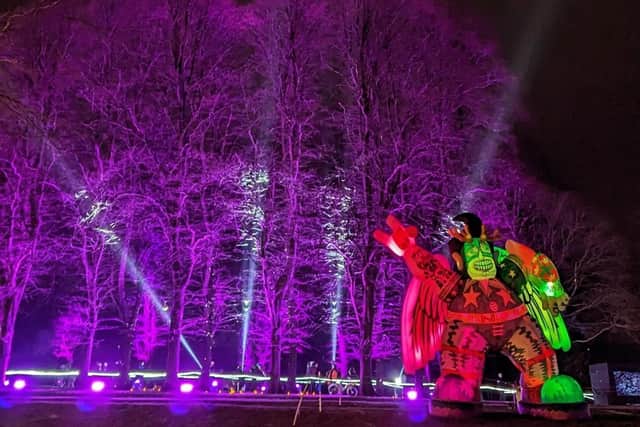 Jason Wilsher Mills sculpture and illuminated trees at Light Night 2024, Carr Bank Park