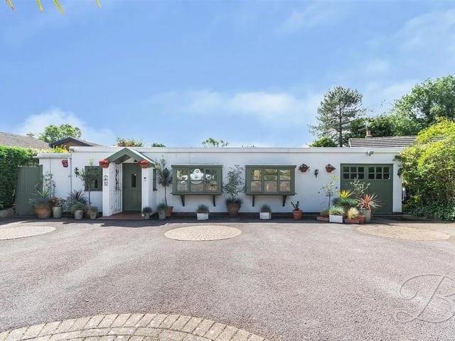 Low maintenance frontage with a driveway and garage, providing off-street parking.