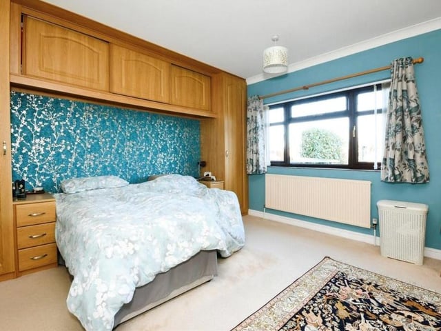 The main bedroom is the largest in the bungalow -- and an impressive sight it makes too. It has been recently fitted with new wardrobes and storage cupboards.