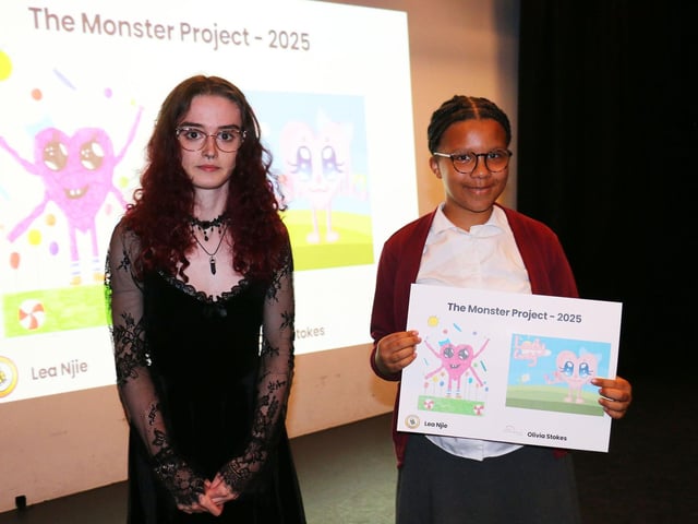Student Olivia Stokes brought Lea Njie's heart-shaped creature to life