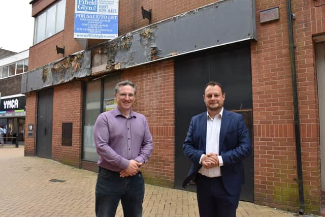 Councillors Matthew Relf and Jason Zadrozny outside the properties planned for regeneration