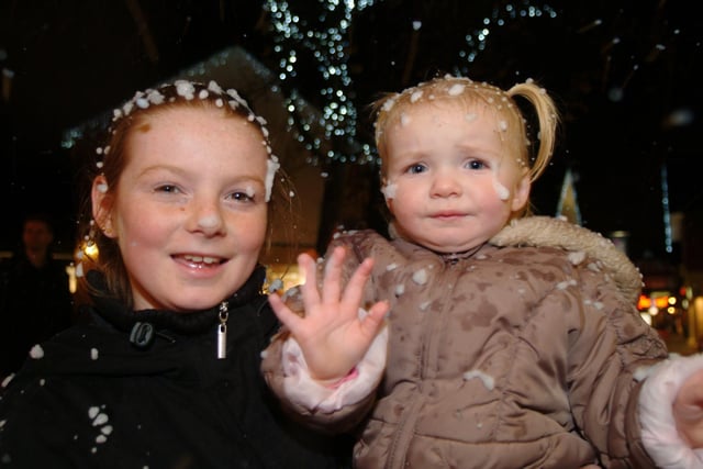 The East Midlands Designer Outlet celebrated the start of their run down to Christmas 2006 with a snow shower. 
Pictured is Jade Shaw aged 11 and her sister.