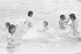 Residents splashing around in 1981. Remember this pool?