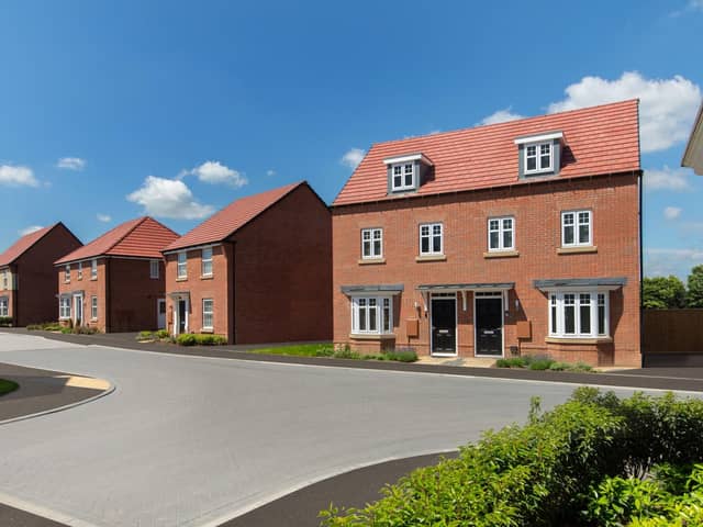 Typical street scene at The Hawthorns featuring a Kennett style home