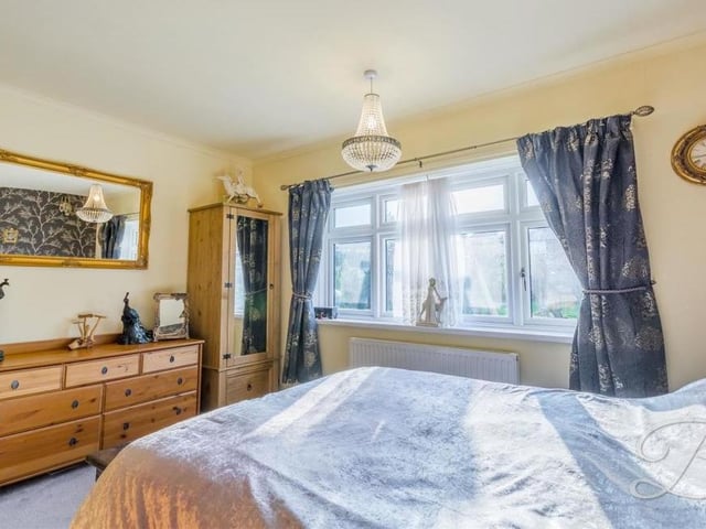 This second shot of the main bedroom at the back of the £350,000 bungalow shows how bright it is.