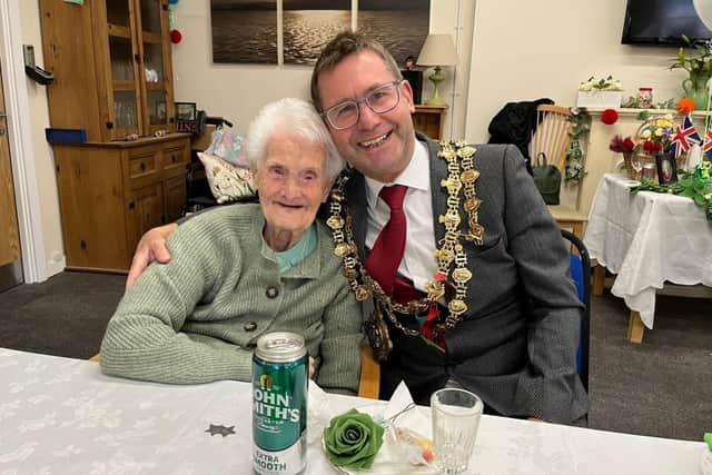 Doll Smith with Mayor Andy Abrahams.