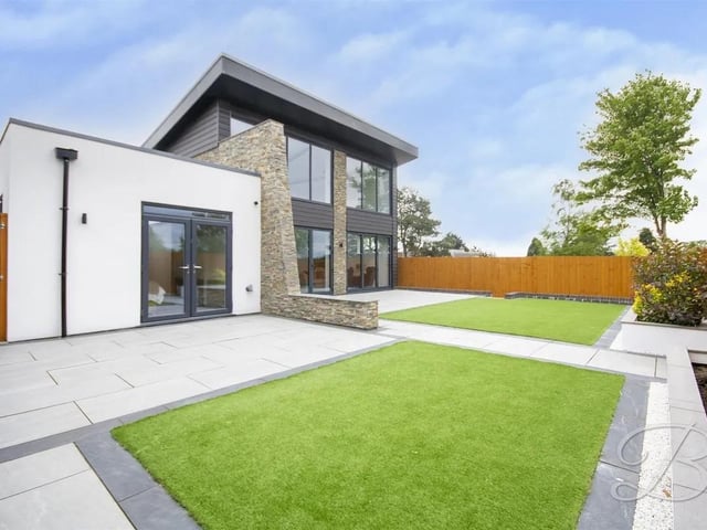 To the rear, the enclosed garden has been designed with ease of maintenance in mind, featuring an artificial lawn and a well-positioned patio seating area, creating a private and inviting outdoor space perfect for relaxing, entertaining, and enjoying throughout the year.