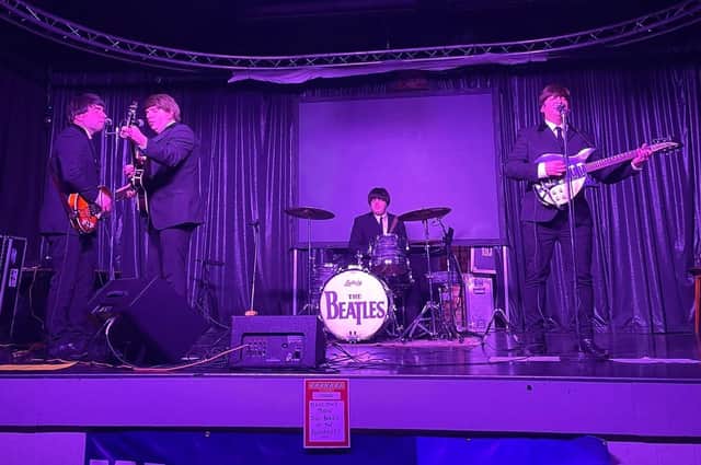 Tribute band, Hey Beatles, on stage at the 'It Was 60 Years Ago Today' show at the Forest Town Arena.
