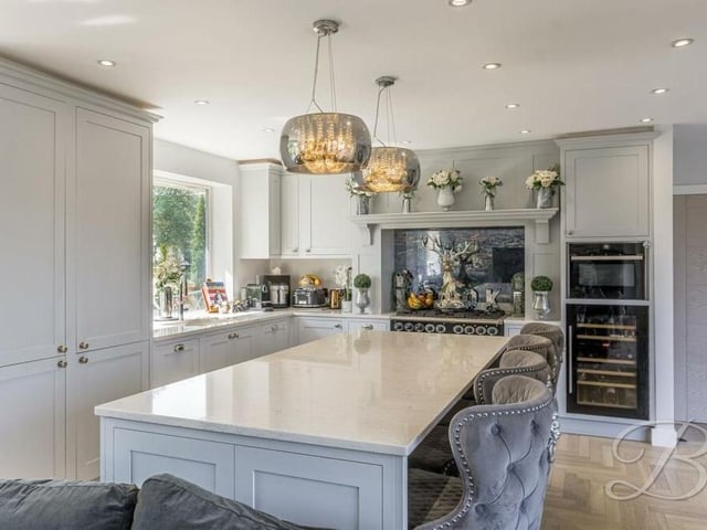 The kitchen/diner is graced with a range of appliances, including microwave, wine cooler, fridge freezer and dishwasher, while there is space for a Rangemaster cooker. Other assets include Shaker-style wall and base units, quartz work surfaces and an inset sink with mixer tap above.