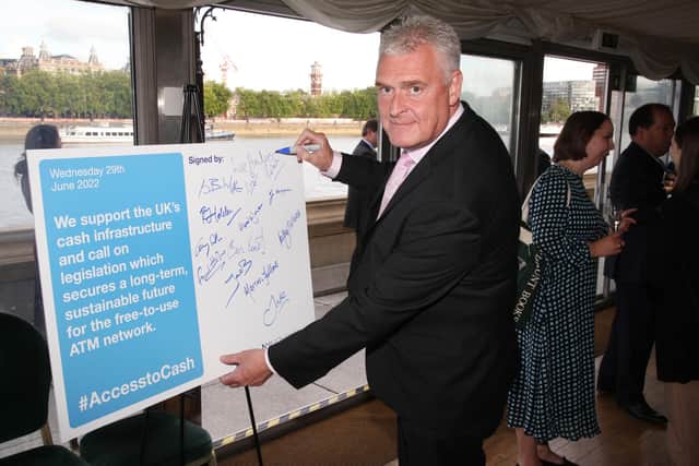 Lee Anderson signing the pledge