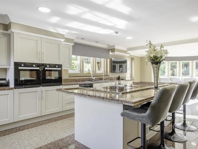 The property boasts a stunning open-plan kitchen and living room