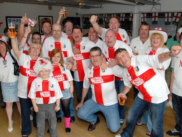 Mansfield Town staff and fans prepare for England's first match of the 2010 World Cup.