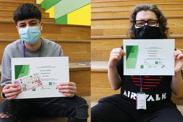 Ben Thorpe and Claydon Groom from the winning group with their certificates