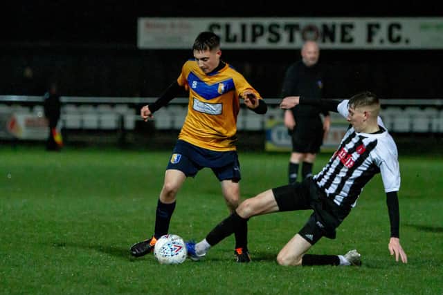 Knott lunges in for a tackle as Clipstone Under-18s beat Mansfield Town under-18s. PHOTO: Dan Walker