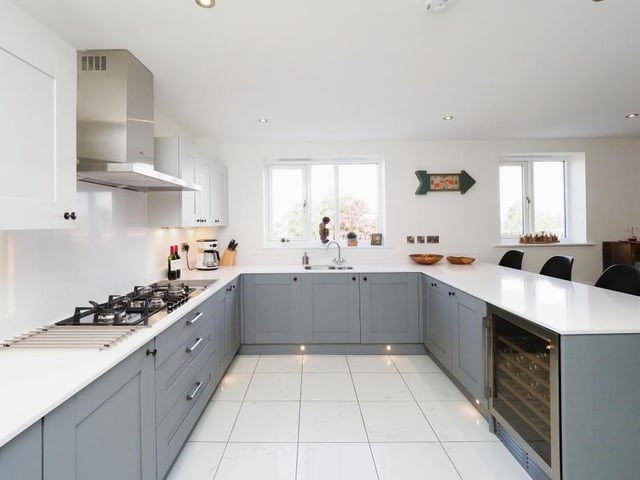 A second shot of the kitchen, which is bright and spacious. Not even Gordon Ramsay would disapprove.