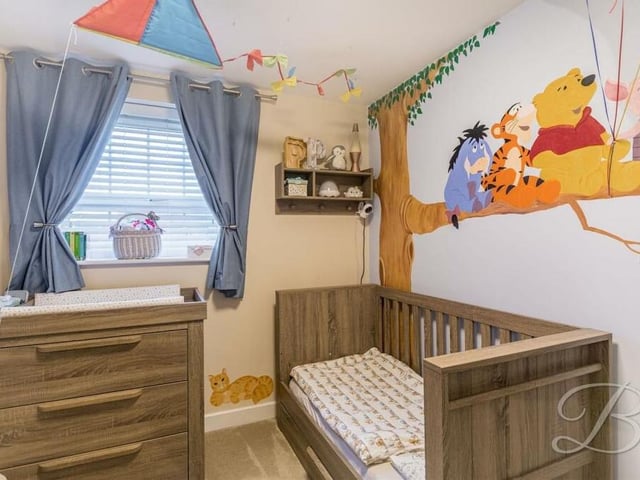 With deference to Winnie The Pooh, this bedroom is also the perfect setting for a young child.
