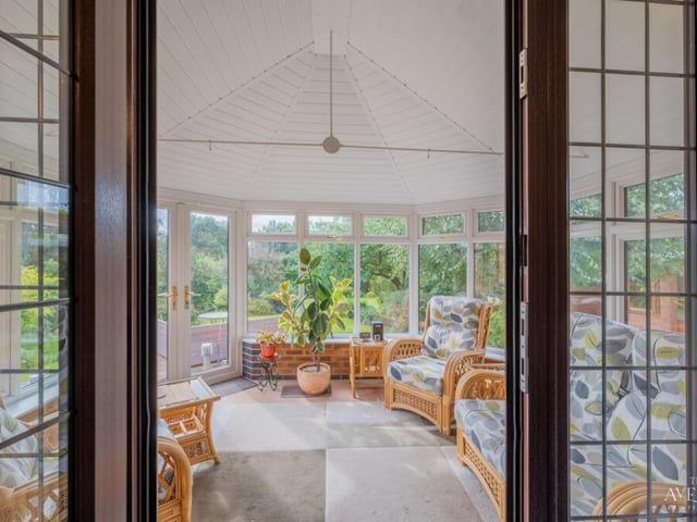 From the lounge, fling open the doors and make your way into the conservatory, which is a bright and warm retreat.