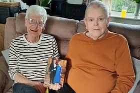 Blidworth couple Tom and Margaret Mounsey with the card from King Charles III and Queen Camilla, congratulating them on their 60th wedding anniversary.