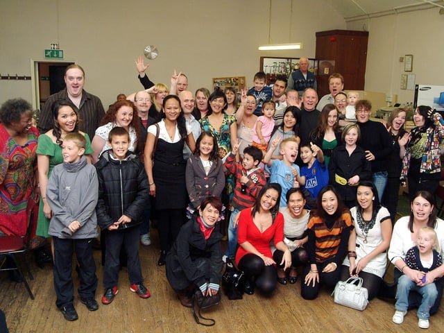 Thai New Year revellers join together with family, friends and supporters for a party held at the Sutton Conservative Club in 2009.