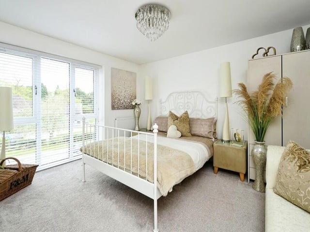 As well as the additional lounge, the first floor houses a shower room and this, the first of the property's four bedrooms. An elegant space is topped off by a full-length double-glazed window overlooking the front.