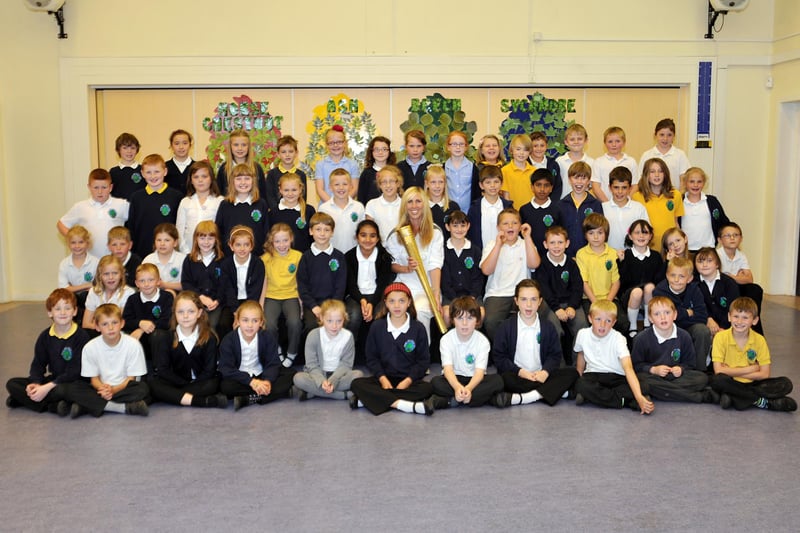 Olympic torch bearer Michele Harrop visited Gateford Park Primary School to show the children her torch, Michele is pictured with class three and four.
