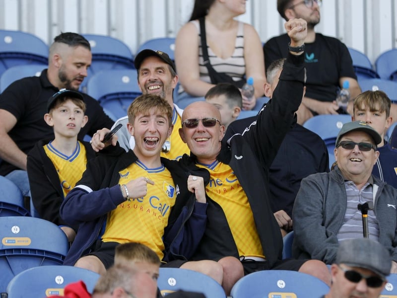 A big home crowd saw Mansfield Town draw with Stockport County.