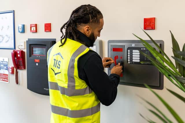 A staff member at work for Mansfield firm, Total Integrated Solutions (TIS)