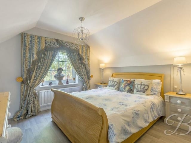 Here is the second of two attractive and spacious bedrooms on the first floor. It faces the side of the £400,000 bungalow.