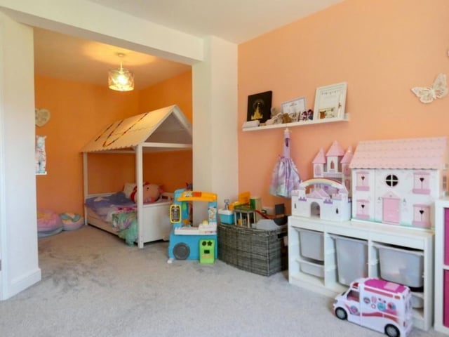 The opposite end of the second bedroom. Cute and cheerful is probably the best way to describe it.