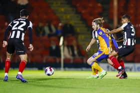 Action from Mansfield Town's 2-0 defeat at Grimsby in the Papa John's Trophy match.
