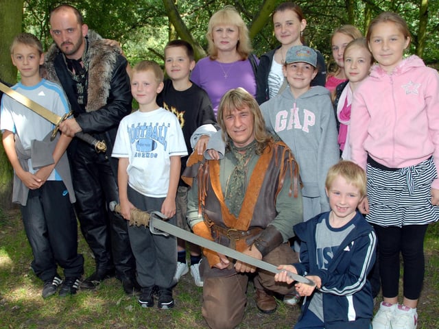 Robin Hood and The Sheriff of Nottingham pictured with youngsters from the Ukraine and Belarus who are staying with members of the Mansfield branch of The Chernobyl Children's Lifeline in 2010.