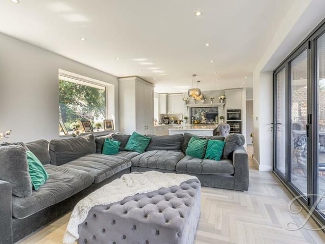 This second shot of the sitting room shows how it is part of the opulent open-plan space that also includes the kitchen/diner.
