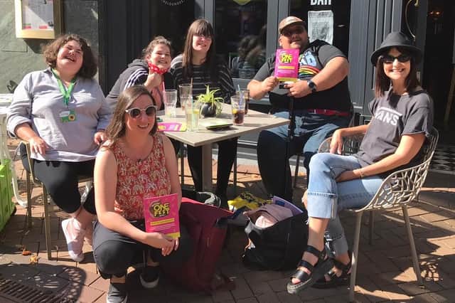 Tracy Radford (front in hat), co-founder of OneConversation, and Susanna Clark (front, crouching), of Ingenious Fools, with members of the OneFest events team, from left, Stacey English, Lucy Gregory, Charlotte Peach and Kriss Steer.