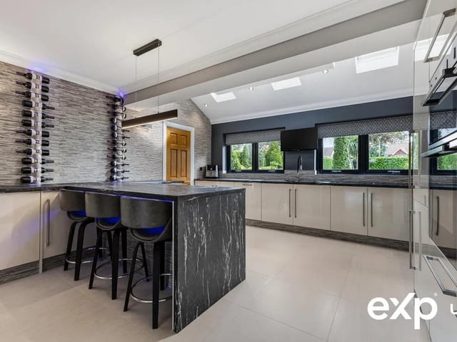 A breath-taking kitchen is presented to the highest standards, with incredible attention to detail.