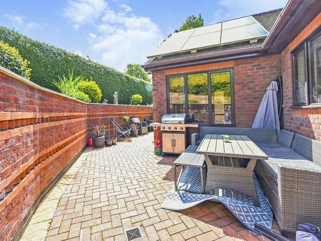 Our final shot shows a patio area that is ideal for summer barbecues.