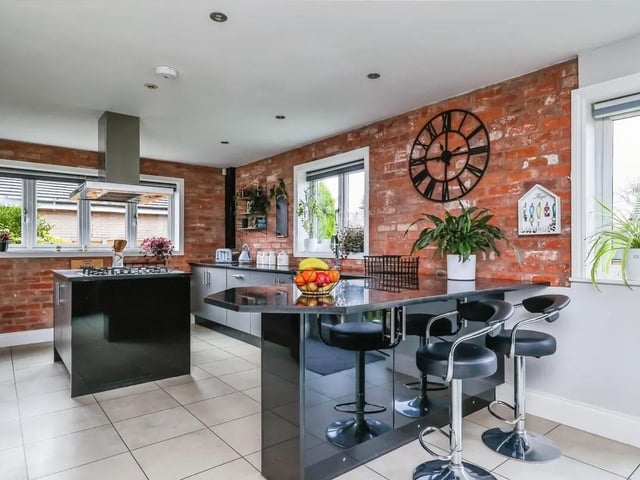 The fully fitted kitchen has a range of integrated appliances