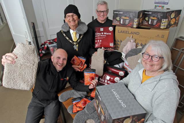 The Mayor of Broxtowe presented some of the donated items to volunteers at Brinsley Foodbank.