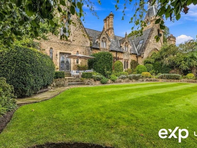 The rear garden is a scenic haven, quintessentially pretty, perfectly landscaped and meticulously maintained