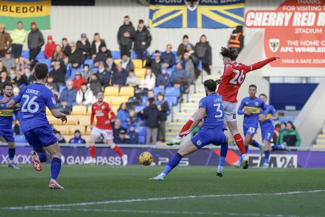Action during the Sky Bet League 2 match against AFC Wimbledon at Cherry Red Records Stadium, 27 Jan 2024 
Photo Chris & Jeanette Holloway / The Bigger Picture.media