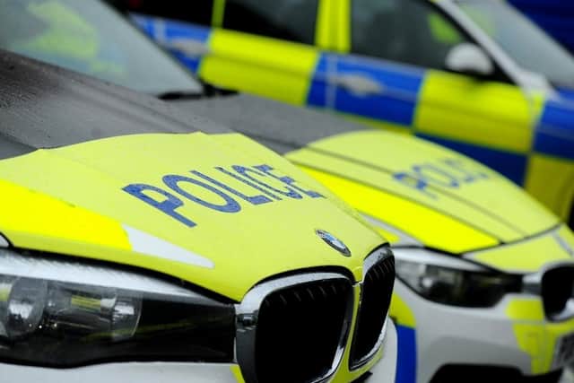 Police teams in Mansfield. Photo: Neil Cross