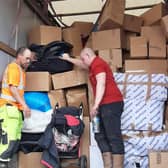 Taylors Transport staff load the eighth lorry load headed to help people in Ukraine. Pictured are Callum Pike  and Stuart Dicks loading the last truck.